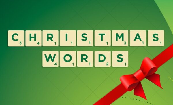 Scrabble tiles: CHRISTMAS WORDS and a red bow